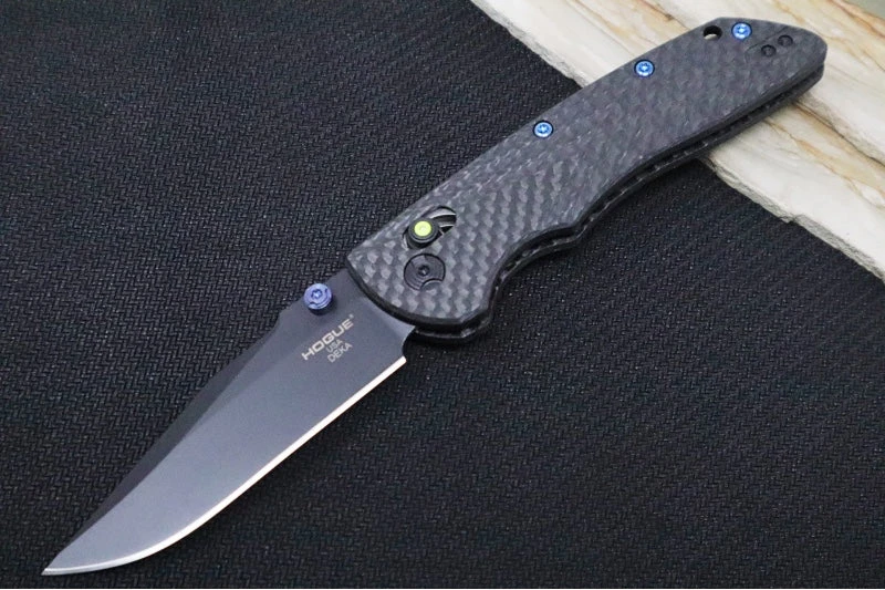 Hogue Knives Deka Collector Series - Black Cerakote Finish / Clip Point Blade / Carbon Fiber Handle / Green Tritium Axis Lock 24299-LIM 1 Hogue Knives Deka Collector Series - Black Cerakote Finish / Clip Point Blade / Carbon Fiber Handle / Green Tritium Axis Lock 24299-LIM